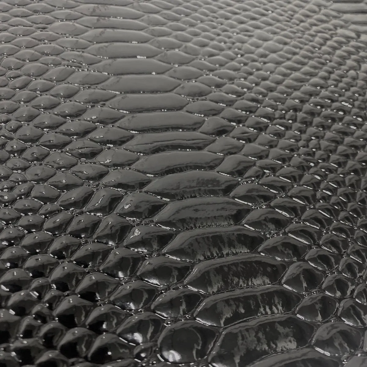 Black Culebra Patent 3D Embossed Snake Skin Vinyl Fabric